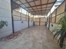 ground floor apartment with a terrace for rent in Deir Ghbar 95m