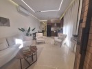 ground floor apartment with a terrace for rent in Deir Ghbar 95m