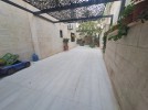 Apartment with a garden for rent in Abdoun 120m