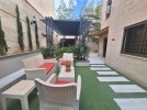 Apartment with a garden for rent in Abdoun 120m