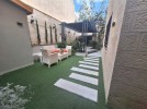 Apartment with a garden for rent in Abdoun 120m
