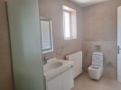 Flat ground floor apartment with a roof for rent in Abdoun 550m 