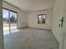 Flat ground floor apartment with a roof for rent in Abdoun 550m 