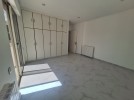 Flat ground floor apartment with a roof for rent in Abdoun 550m 