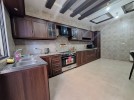 Furnished Semi ground floor apartment for rent in Al-kursi with building area of 220 m