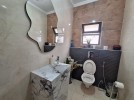 Fifth floor with a spacious balcony for rent in Al Rabieh 202m