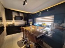 Fifth floor with a spacious balcony for rent in Al Rabieh 202m