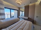 Apartment with private garage for rent in Abdoun 125m