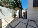 Apartment with a garden for rent in Abdoun 350m