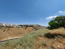 Land area of 1127 sqm for sale in Al Kursi on two streets