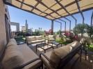 Flat and duplex last floor with roof for sale in Um Al-Summaq 470m