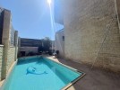 Villa for sale in Rujm Omiash with a building area of 750m