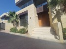 Attached villa for sale in Abdoun with a building area of 770m