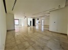 Attached villa for sale in Abdoun with a building area of 770m