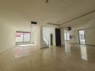 Attached villa for sale in Abdoun with a building area of 700m