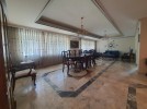 Two attached villas for sale in Dabouq with a land area of 1500m