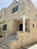 Attached villa for sale in Marj Al Hamam with a building area of 200m