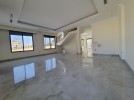 Attached villa for sale in Al Bunyyat with a building area of 500m