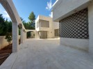 Standalone villa for sale in Abdoun with a land area of 1000m