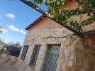 Farm with chalet for sale in Jerash with a land area of 7165m