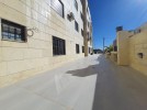 Ground floor with garden for sale in Qaryet Al Nakheel 205m