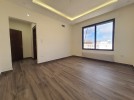 Second floor apartment for sale in Qaryet Al Nakheel 210m