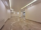 Apartment with garden for sale in Qaryet Al Nakheel 270m