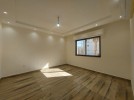 Attached villa for sale in Abdoun with a building area of 400m