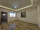 Attached villa for sale in Abdoun with a building area of 400m