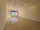 شقة اخير مع روف دوبلكس للبيع في رجم عميش، بمساحة اجمالية 250م