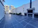 Apartment with garden for sale in Qaryet Al Nakheel, area of 200m