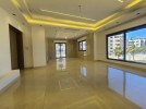 First floor apartment for sale in Qaryet Al Nakheel, an area of 200m
