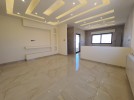 Duplex last floor with roof for sale in Marj El Hamam an area of 176m