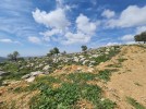 Land for building a private villa for sale in Al Bassa, area 1086m