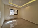 Ground floor with a garden for sale in Al Shmeisani an area of 220m
