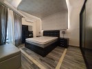 Furnished first floor for sale in Hai Al-Sahaba building area of 150m