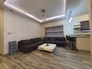 Furnished first floor for sale in Hai Al-Sahaba building area of 150m