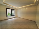 Ground floor with terrace apartment for sale in Um Uthaina 150m