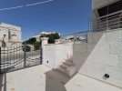 Ground floor apartment for sale in Khalda with a building area of 235m