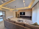 Furnished flat roof for sale in Al Fuhais with a building area of 450m