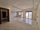 شقة طابقية مع روف دوبلكس للبيع في دير غبار بمساحة اجمالية 279م