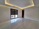 Ground floor with terrace for sale in Um Uthaina 150m