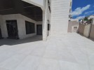 Apartment with a garden for sale in Al Fuhais 263m