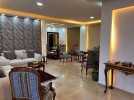 Ground floor apartment with garden for sale in Umm Al-Summaq 320m