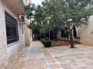 Ground floor apartment with garden for sale in Umm Al-Summaq 320m
