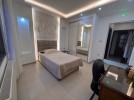 Ground floor apartment with garden for sale in Umm Al-Summaq 320m