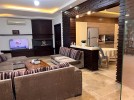 Ground floor apartment with garden for sale in Umm Al-Summaq 320m