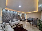 Ground floor apartment with garden for sale in Umm Al-Summaq 320m