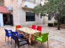 Ground floor apartment with garden for sale in Umm Al-Summaq 320m