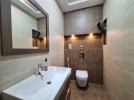Ground floor apartment with garden for sale in Umm Al-Summaq 320m